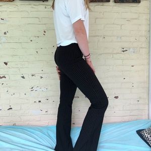 Black pants with white stripes